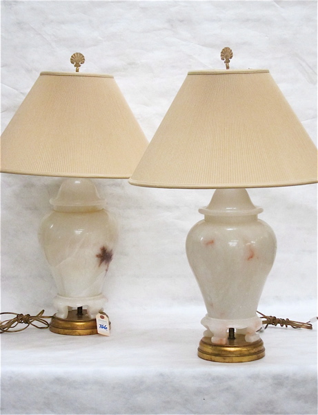 Appraisal: A PAIR OF WHITE ALABASTER TABLE LAMPS with shades each