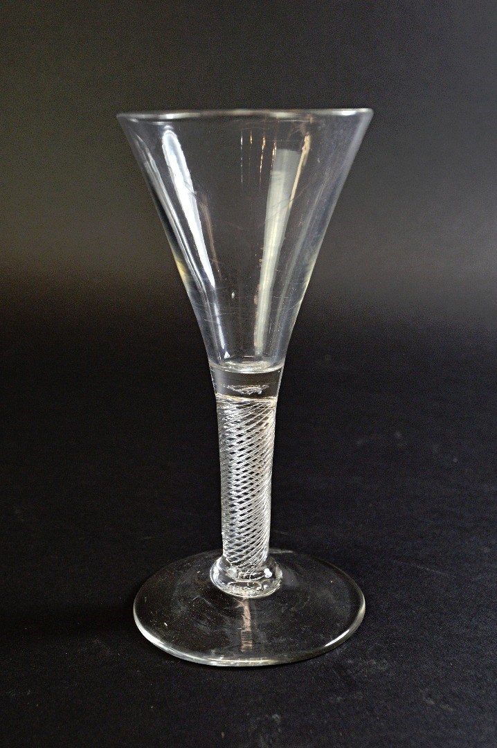 Appraisal: An English wine glass mid th century with drawn trumpet