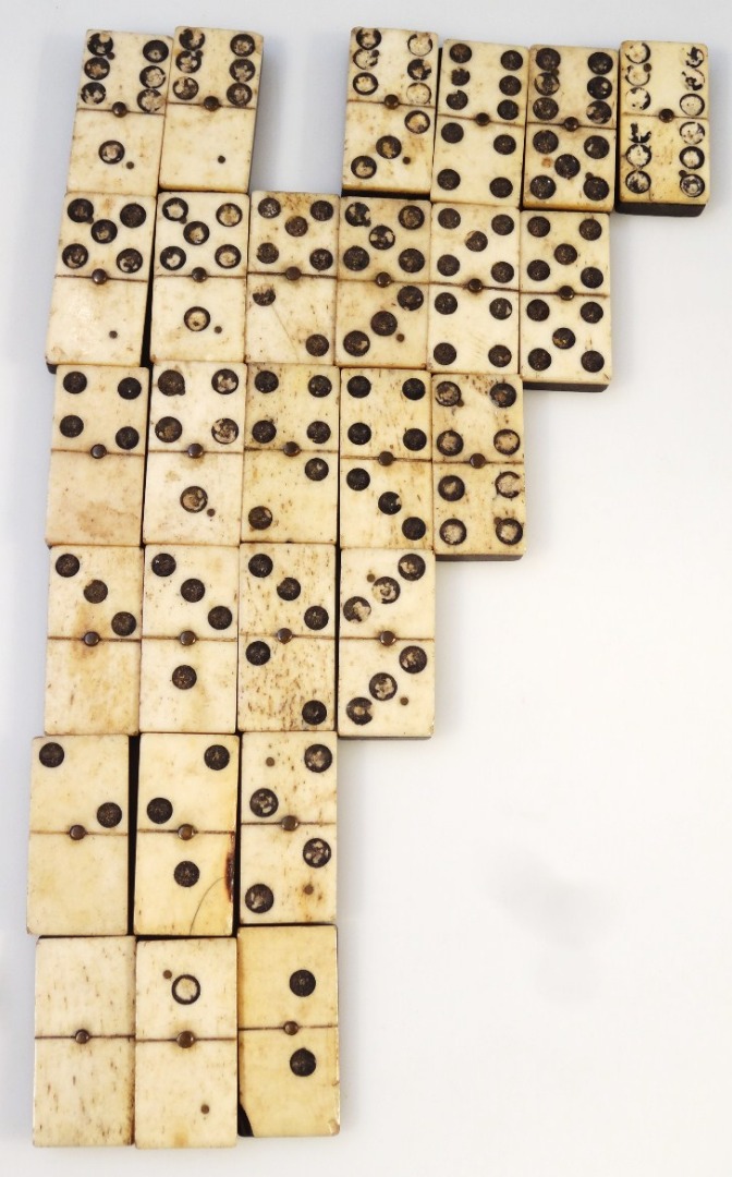 Appraisal: A set of bone and ebony dominoes probably early thC