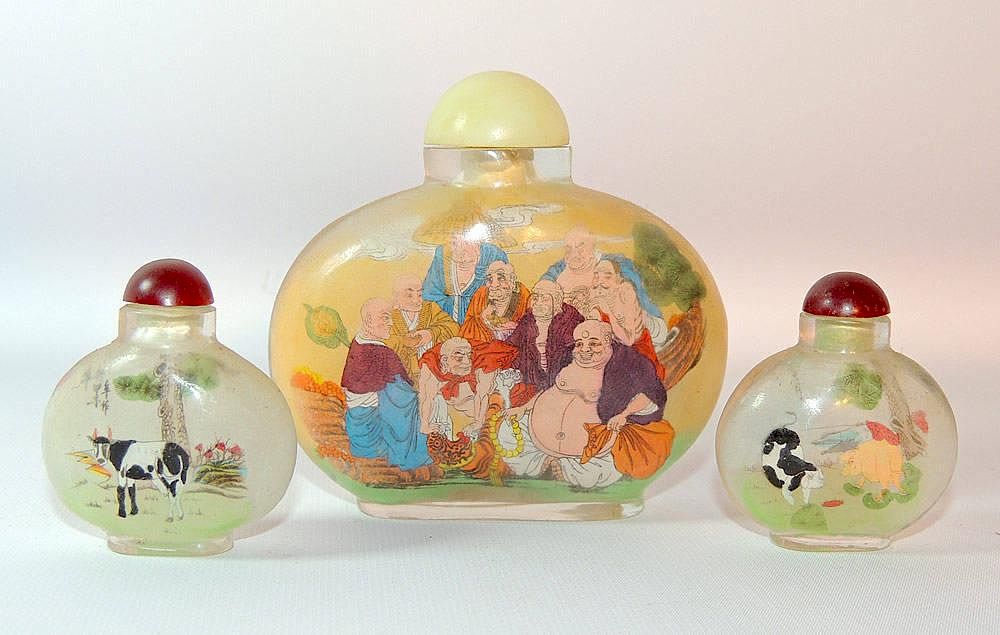 Appraisal: Three Interior-Painted Glass Snuff Bottles Three interior-painted glass snuff bottles