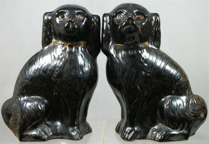 Appraisal: Pr redware black spaniels glass eyes missing one faint gilt