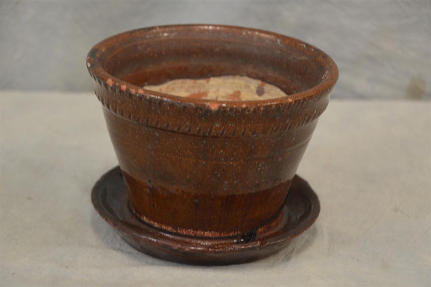 Appraisal: Redware flower pot with attached underplate th C - dia