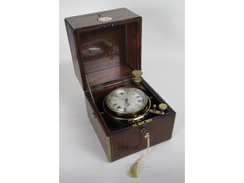 Appraisal: A marine chronometer by Robert Molyneux with silvered dial signed