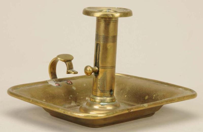 Appraisal: Square Base Chamberstick Description Replaced knob Lacking snuffer Fair condition