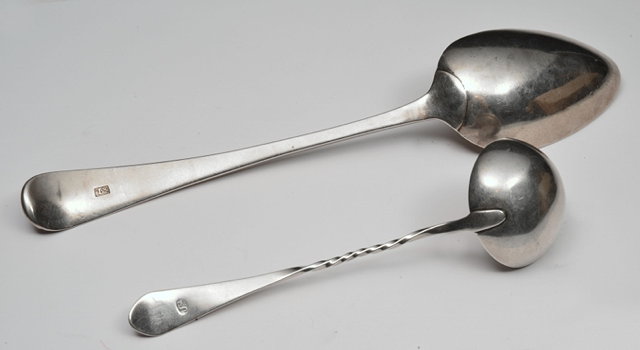 Appraisal: AN OLD ENGLISH PATTERN TABLESPOON probably Scottish provincial silver maker's