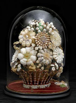 Appraisal: VICTORIAN SHELLWORK CENTERPIECE In the form of a flower-filled basket