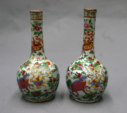 Appraisal: A pair of famille verte vases with elongated necks with