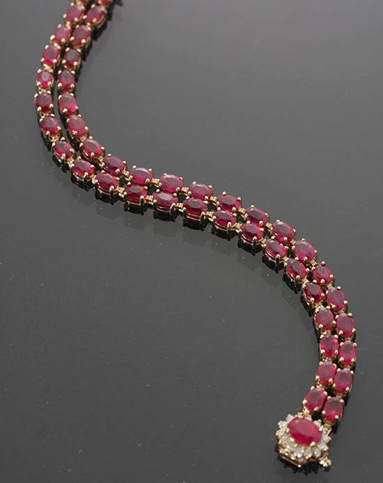 Appraisal: -Karat Yellow-Gold and Ruby Bracelet The double strand having forty-four