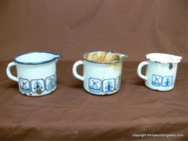 Appraisal: Lot of Enamelware Dutch Pattern Handled Pitchers - the largest