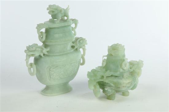 Appraisal: TWO CARVED INCENSE BURNERS China th century Pale green stone