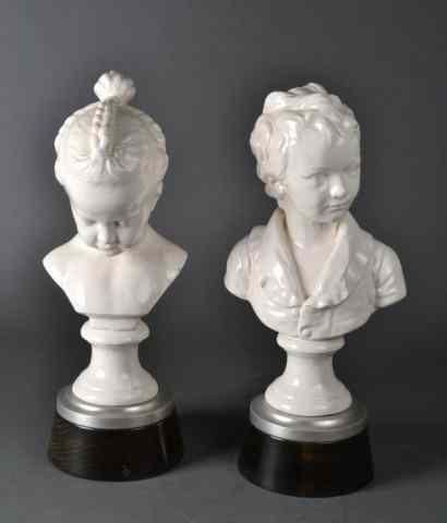 Appraisal: Pr Of Large Glazed Porcelain BustsFinely molded to depict children