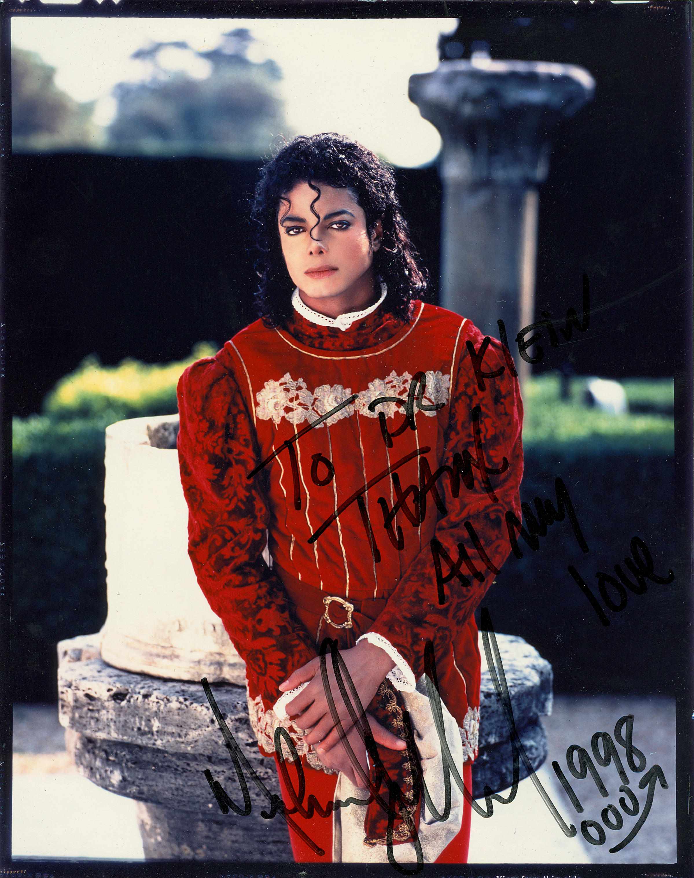 Appraisal: Michael Jackson inscribed and signed photograph Color photograph of Jackson