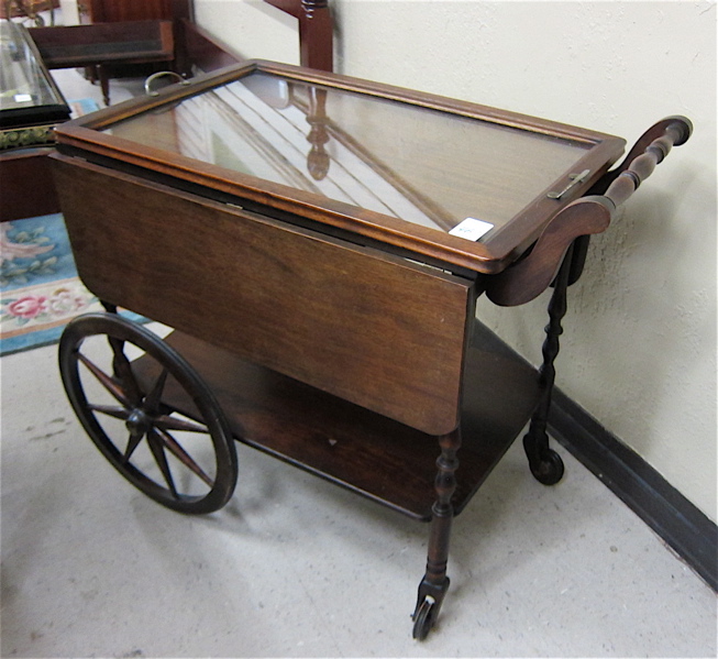 Appraisal: WALNUT DROP-LEAF TEA CART American c s a rectangular -tier