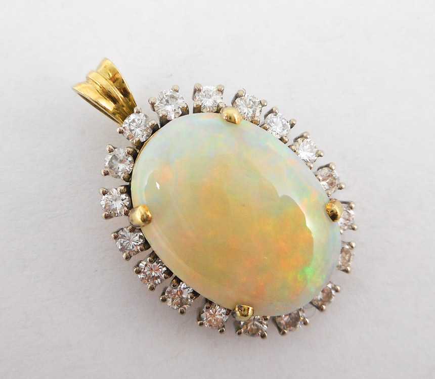 Appraisal: OPAL DIAMOND AND FOURTEEN KARAT GOLD PENDANT The yellow and