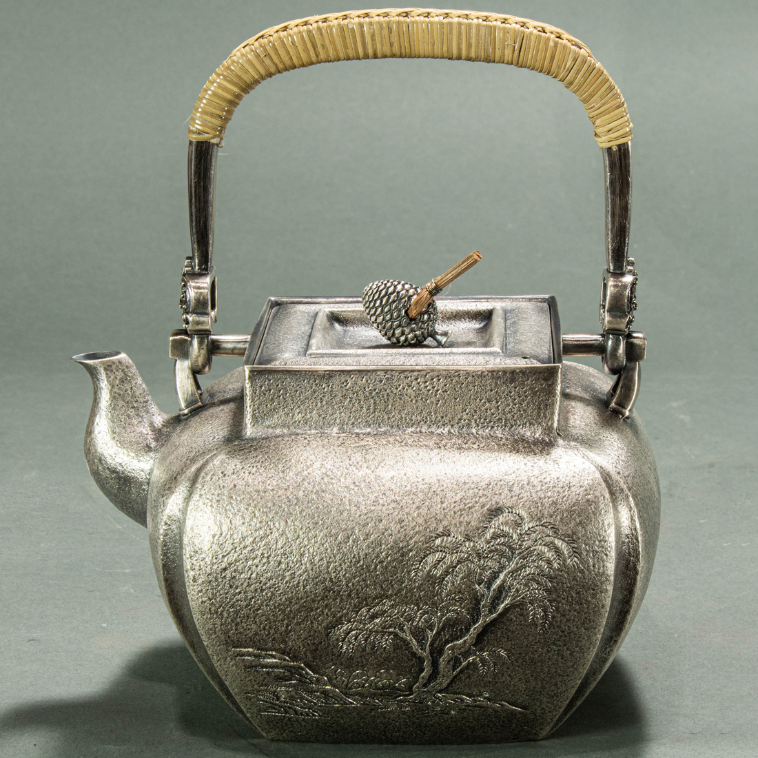 Appraisal: JAPANESE SILVER TEAPOT Japanese silver teapot of rounded square form