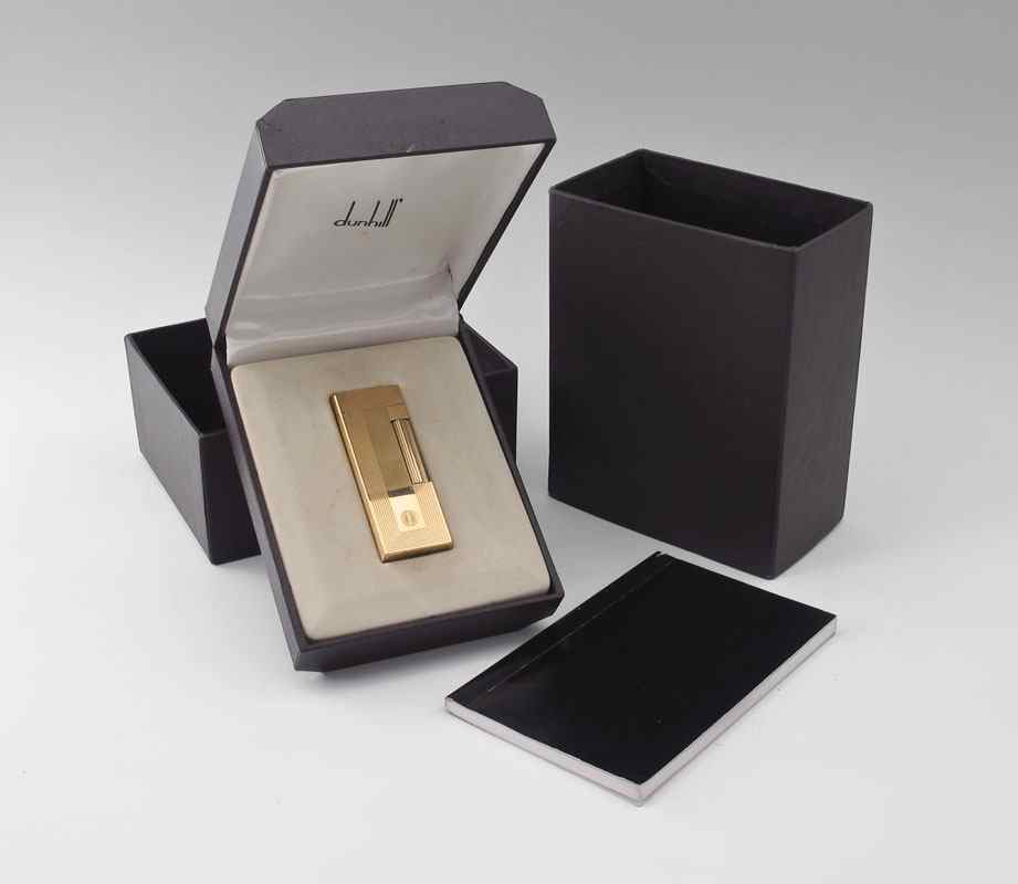 Appraisal: GOLD TONED DUNHILL LIGHTER Serial number Lightly used with minor