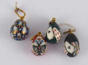 Appraisal: Four Russian enamelled eggs all maker's mark only