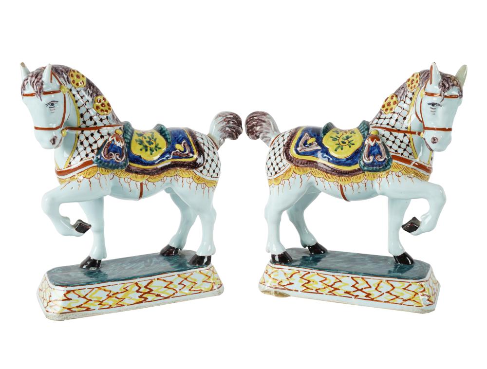 Appraisal: PAIR OF FAIENCE HORSE FIGURESeach with red painted mark Condition