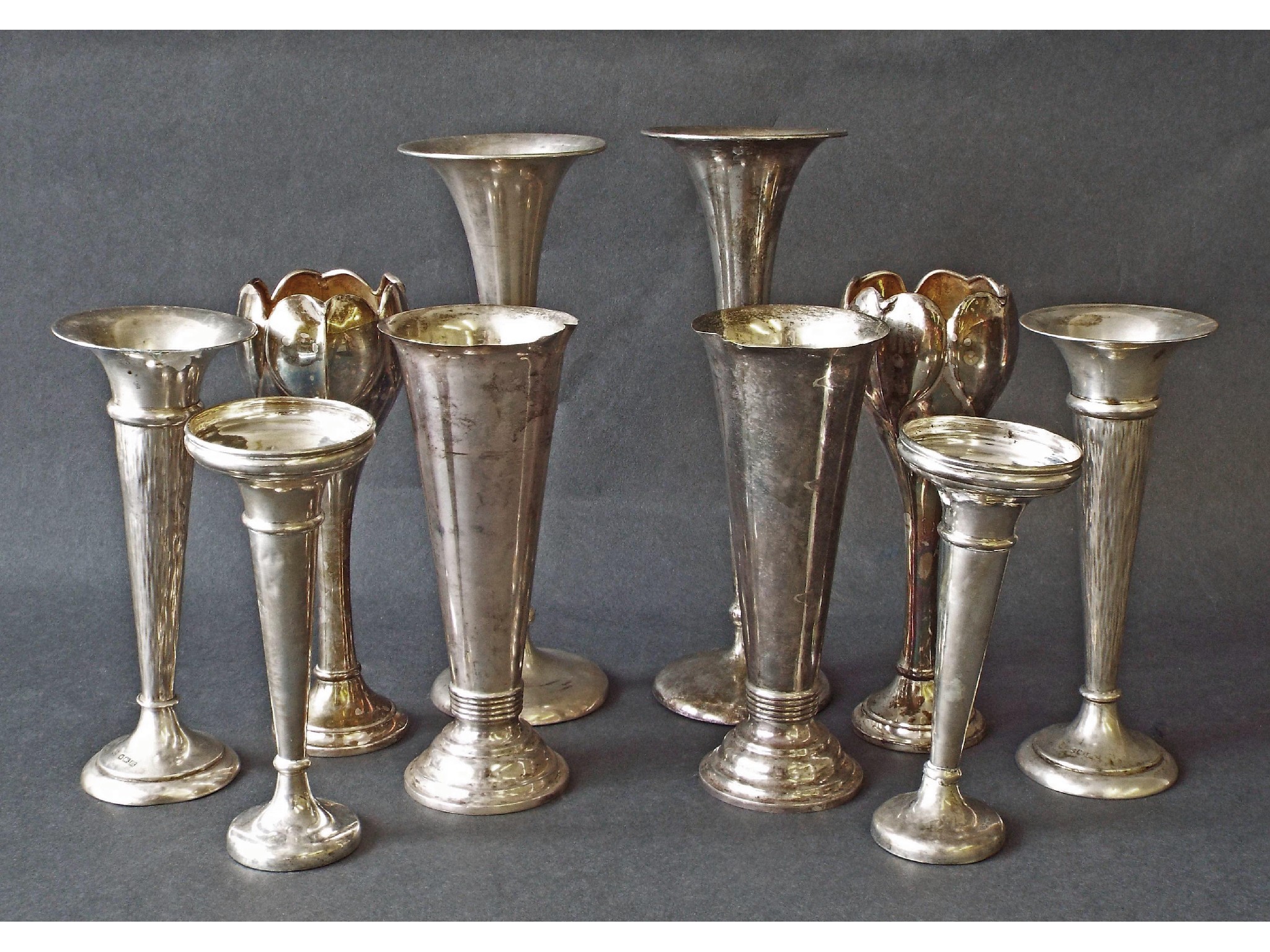 Appraisal: Pair of Edwardian silver stylised tulip vases with gilt interiors