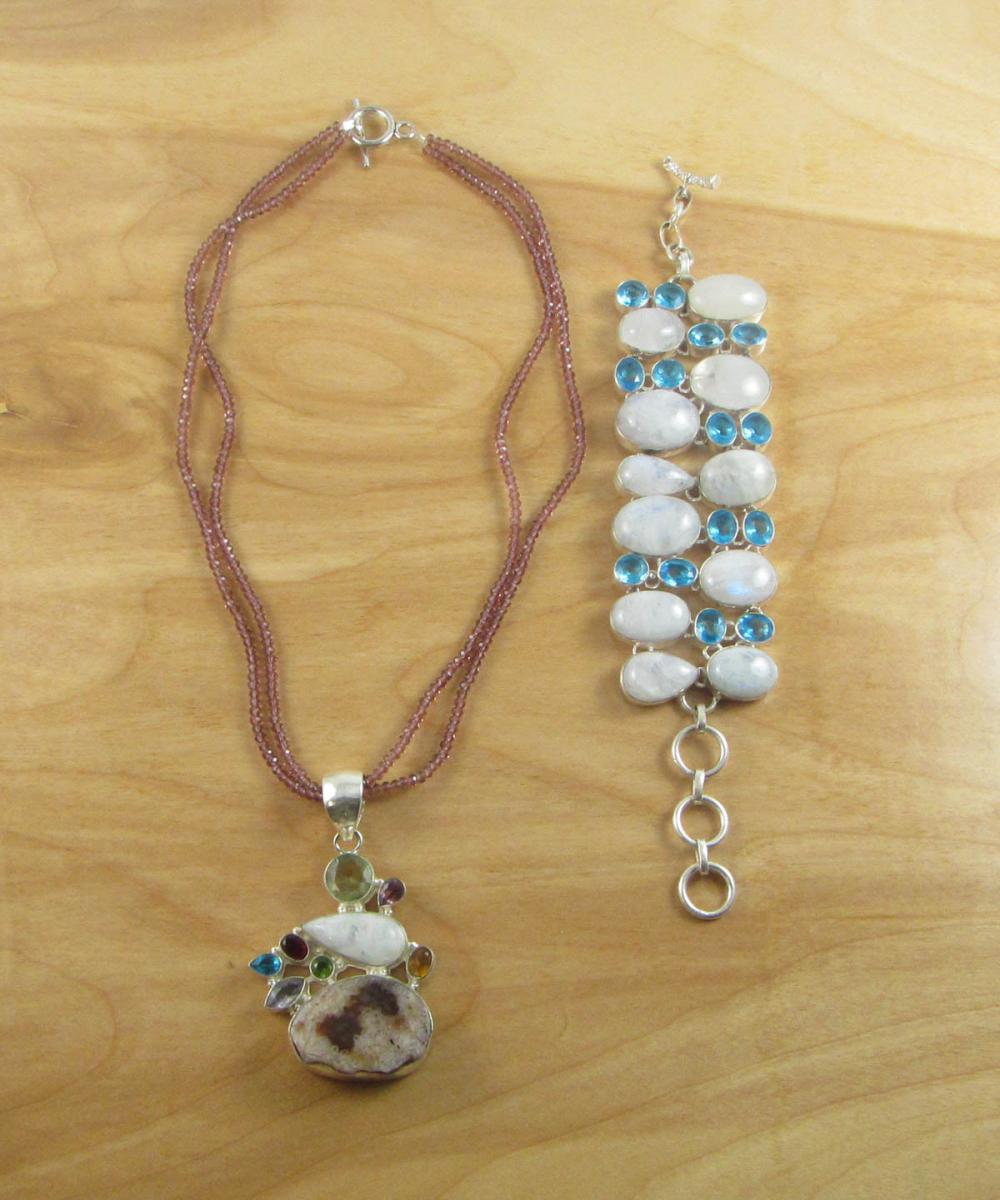 Appraisal: TWO ARTICLES OF MOONSTONE AND TOPAZ JEWELRY including a pendant