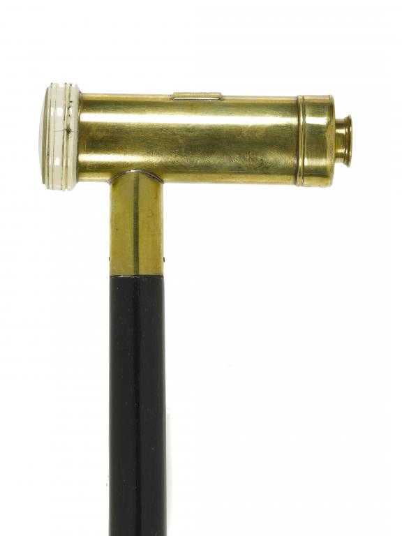 Appraisal: A VICTORIAN EBONY GADGET CANE the brass handle incorporating a