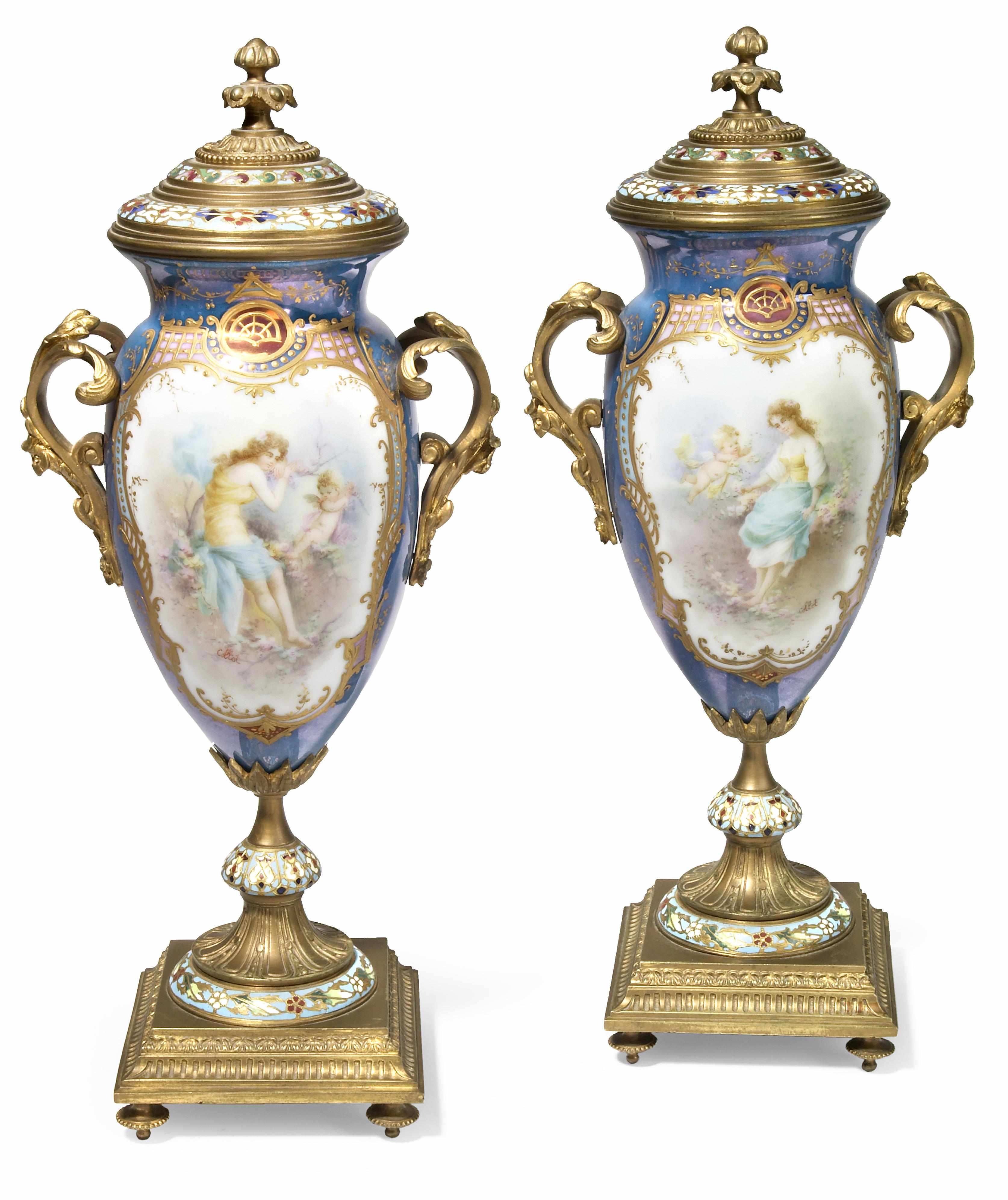 Appraisal: A pair of French gilt bronze and champlev enamel mounted