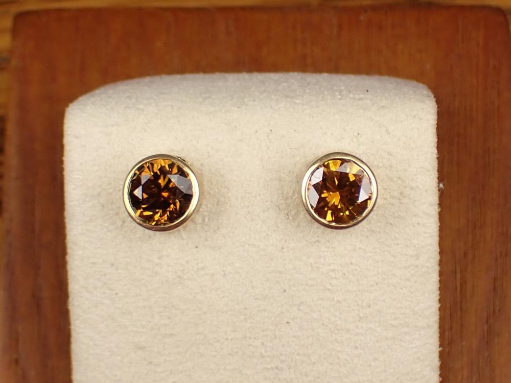 Appraisal: PAIR OF FANCY COLORED DIAMOND EAR STUDS each k yellow