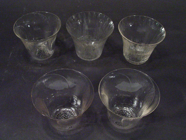 Appraisal: Five flared Lalique clear glass cups moulded with petals and