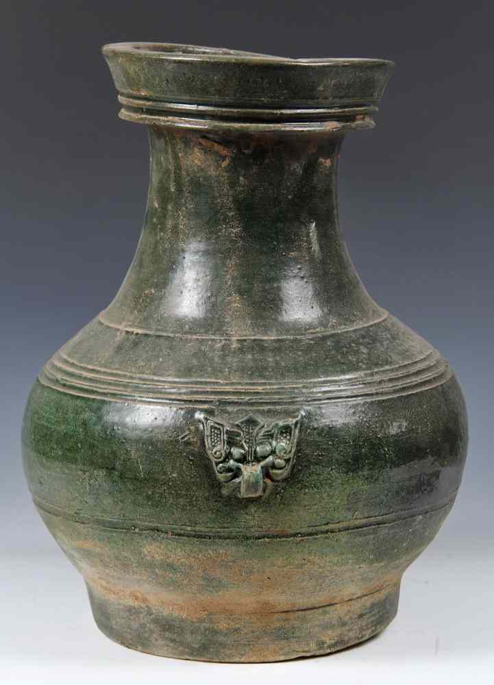 Appraisal: A LARGE GREEN-GLAZED POTTERY JAR Chinese Han Dynasty BC-AD Handsome