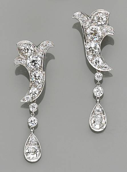 Appraisal: A pair of diamond and platinum earrings of stylized fleur-de-lys