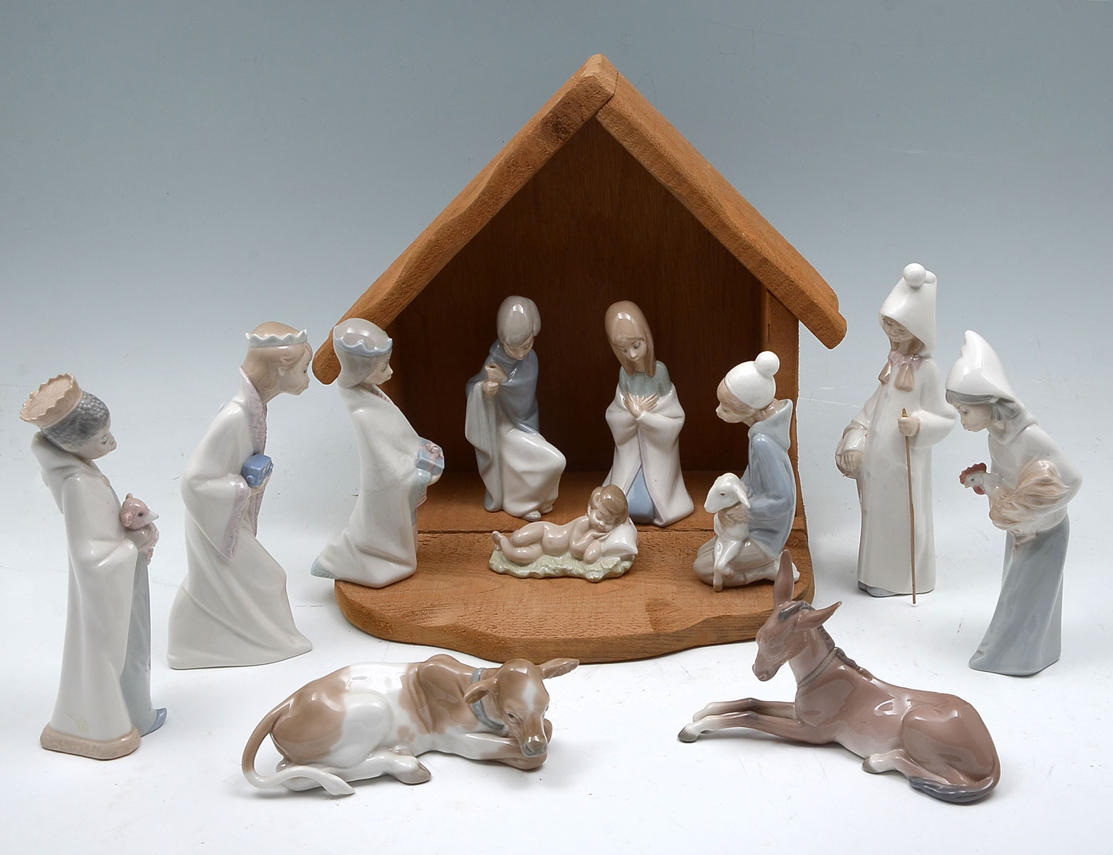 Appraisal: PIECE LLADRO NATIVITY SET ''Shepardess With Basket ''Saint Joseph'' ''Jesus''