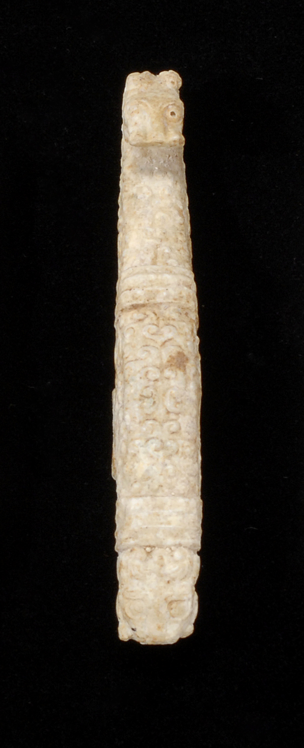 Appraisal: CHICKEN BONE JADE GIRDLE HOOK Han DynastyIn dragon form Length