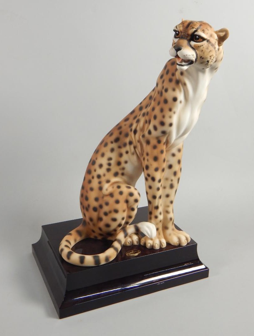 Appraisal: A Florence composition limited edition figure of a cheetah modelled