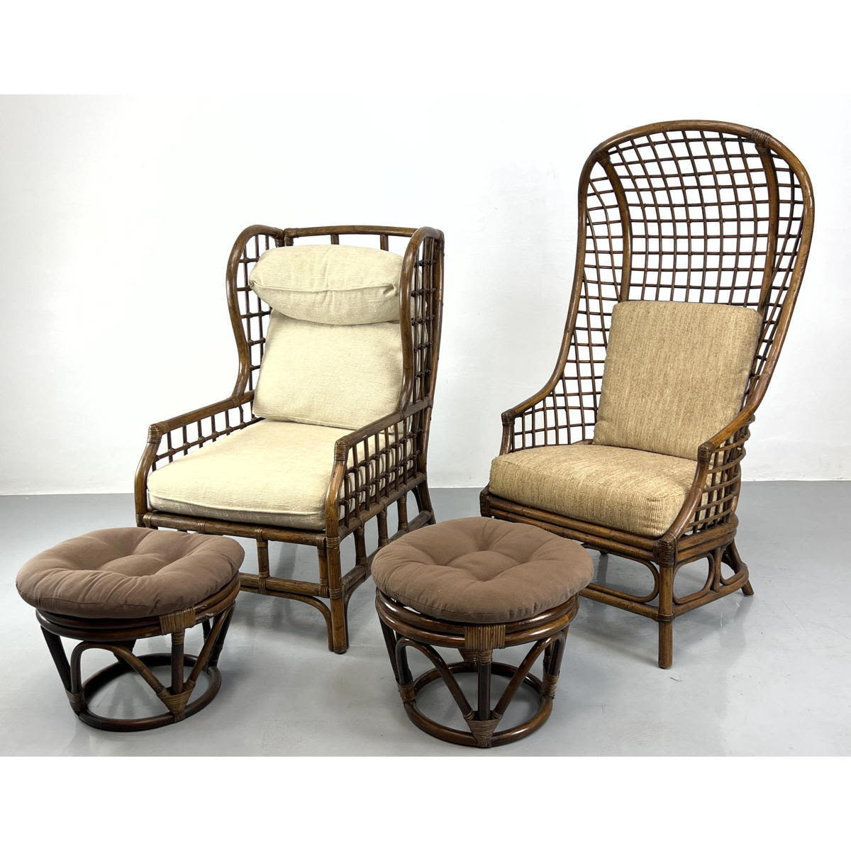 Appraisal: pc Dark Stained Rattan Chairs and Ottoman Hooded Woven Rattan