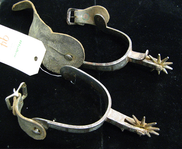 Appraisal: PAIR OF AUGUST BUERMANN SILVER INLAID SPURS ten point rowels