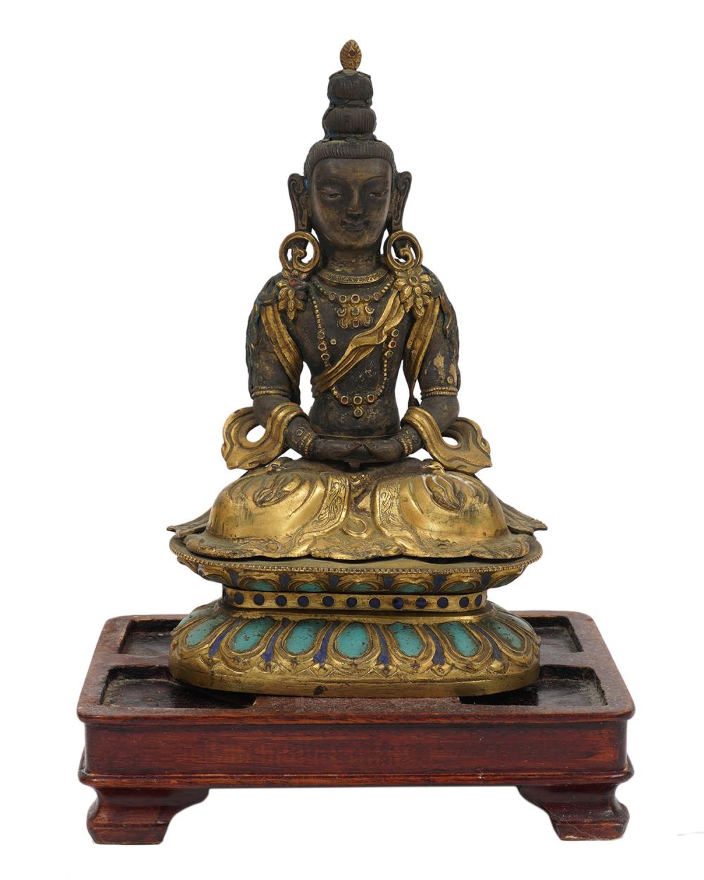 Appraisal: POSSIBLY NEPALESE FIRE GILT BRONZE BUDDHAFire gilt bronze Buddha possible