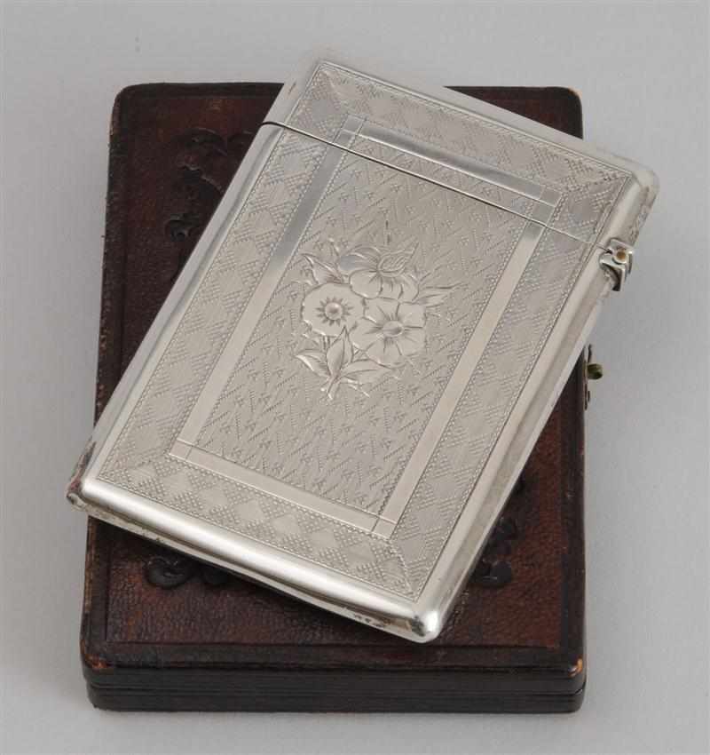 Appraisal: AMERICAN ENGRAVED SILVER CALLING CARD CASE AND A DAGUERROTYPE PORTRAIT