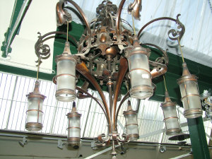 Appraisal: An art -nouveau style seven light copper finished chandelier with