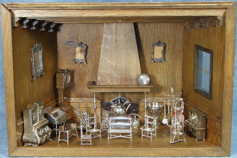 Appraisal: Miniature parlor diorama with pcs mostly silver Dutch furniture and