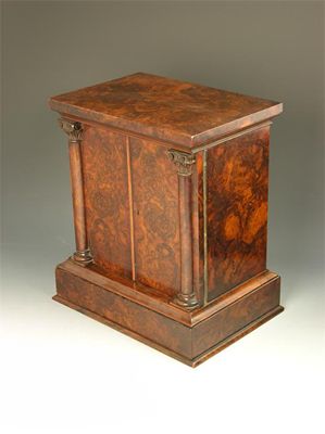 Appraisal: A Victorian burr walnut humidor with carved capital pilasters to