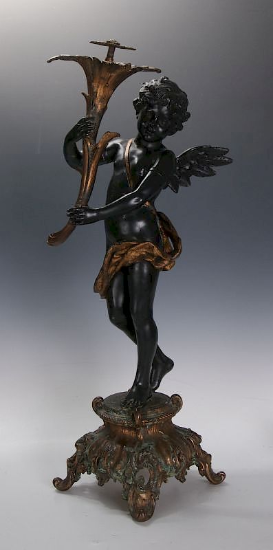 Appraisal: AN ANTIQUE -INCH PATINATED SPELTER CUPID FIGURE The standing figure