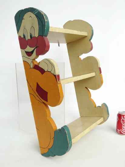 Appraisal: Vintage wall shelf with painted cartoon figure sides '' W