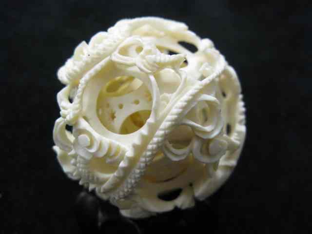 Appraisal: Carved Ivory Mystery Ball inner balls dragon decor '' diameter