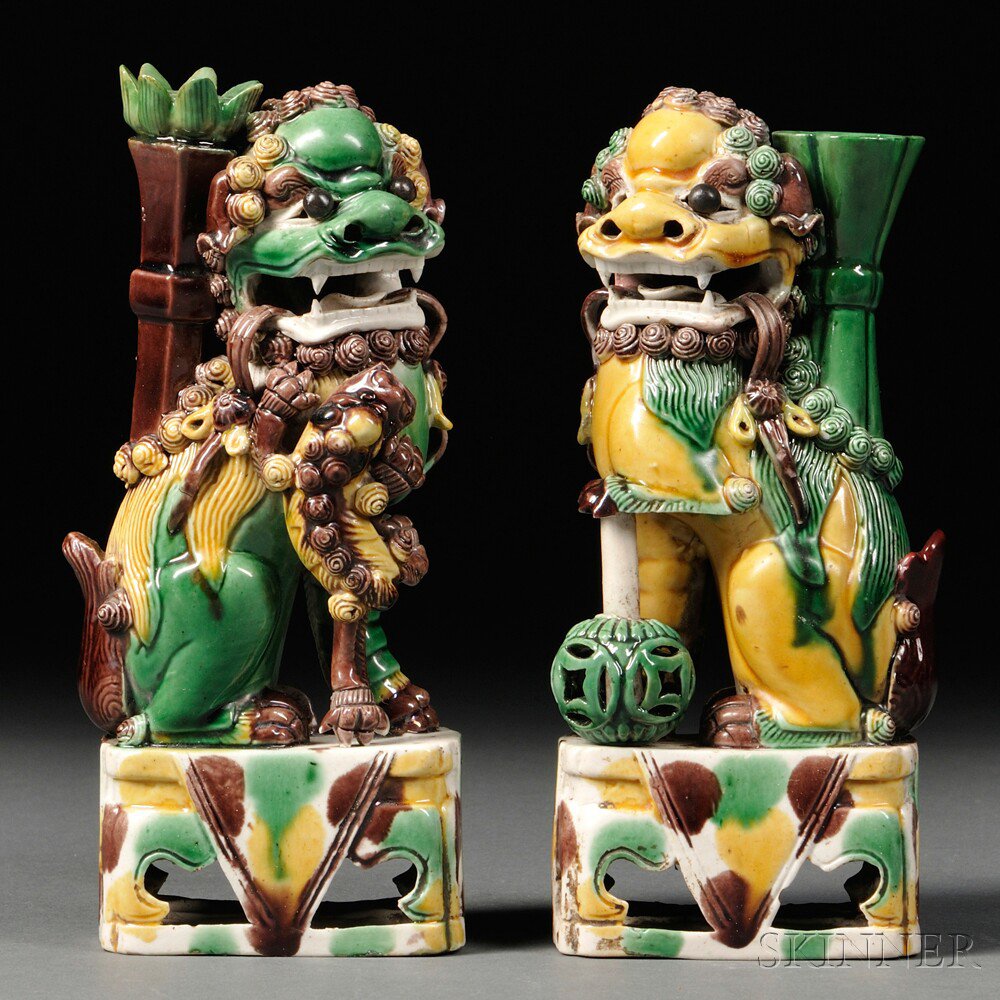 Appraisal: Pair of Egg-and-spinach-glazed Incense Holders China th th century in