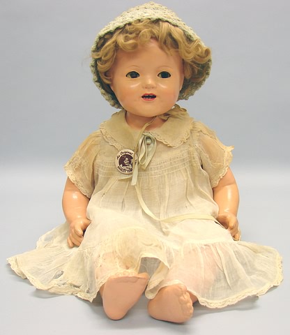 Appraisal: Compo cloth baby Doll is unmarked Head and shoulderplate have