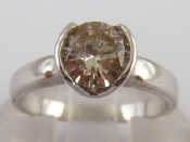 Appraisal: A white metal tests carat gold diamond solitaire ring the