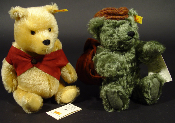 Appraisal: Two jointed Steiff teddy bears Winnie the Pooh with certificate