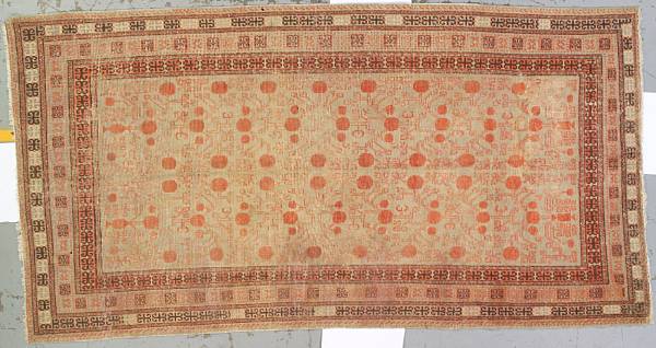 Appraisal: A Khotan long carpet East Turkestan late th century size