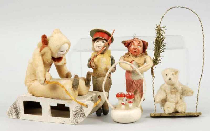 Appraisal: Lot of Cotton Batting Figures Description Two figures are dressed