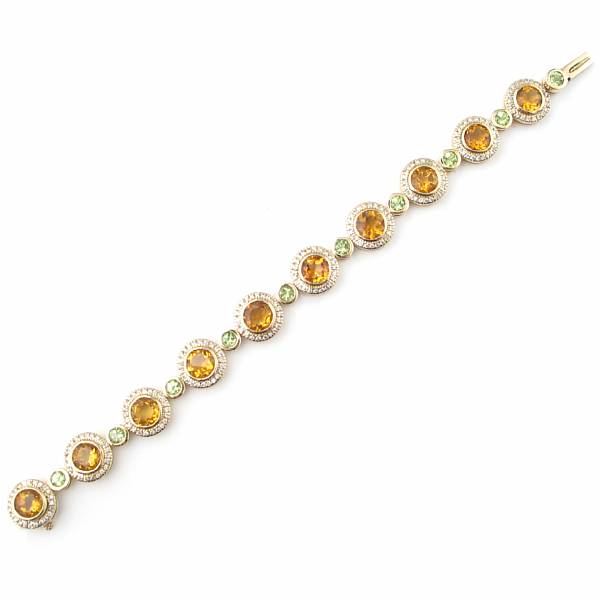 Appraisal: A citrine peridot diamond and k yellow gold bracelet golden